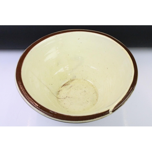 85 - 19th century Cream Slipware Glazed Terracotta Dairy Bowl, 40cm diameter