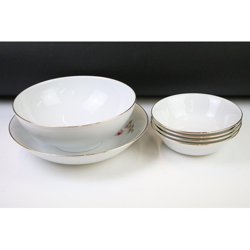 93 - Limoges 'Rose De Monaco' tea & dinner service to include 12 dinner plates, 12 soup bowls, oval platt... 