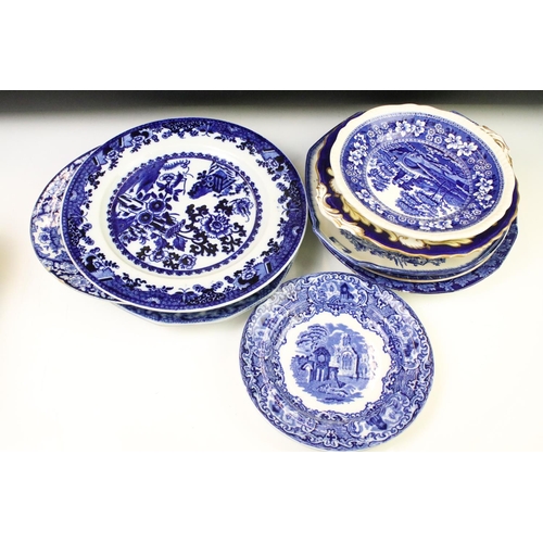 96 - Collection of blue & white plates / dishes, mostly 19th century examples, to include Copeland Spode ... 