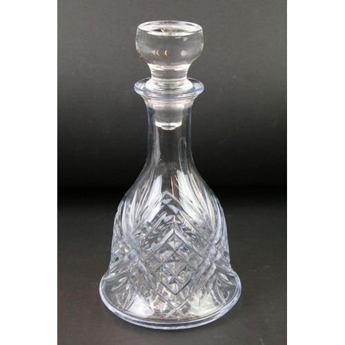 99 - Four moulded / cut glass decanters to include a hobnail effect ships decanter, bell-shaped decanter,... 