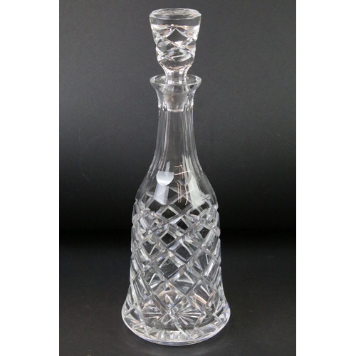 99 - Four moulded / cut glass decanters to include a hobnail effect ships decanter, bell-shaped decanter,... 