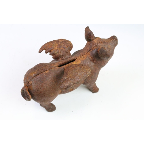 147 - Group of early 20th Century cast iron money boxes to include a flying pig, two humpty dumpty money b... 