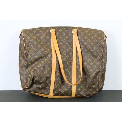 270 - Louis Vuitton - Monogrammed holdall travel bag having tanned leather straps and canvas lined interio... 