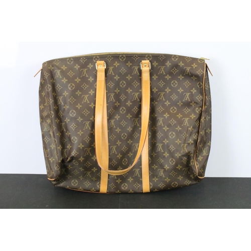 270 - Louis Vuitton - Monogrammed holdall travel bag having tanned leather straps and canvas lined interio... 