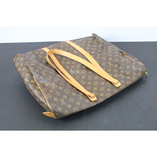 270 - Louis Vuitton - Monogrammed holdall travel bag having tanned leather straps and canvas lined interio... 