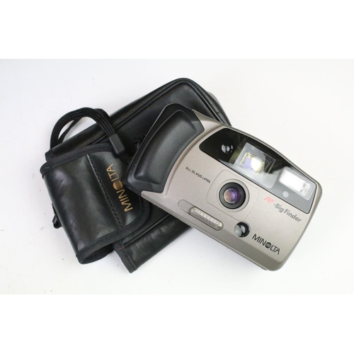 452 - Group of cameras to include an Olympus trip 35 film camera with tripod and camera bag, Praktica PL n... 