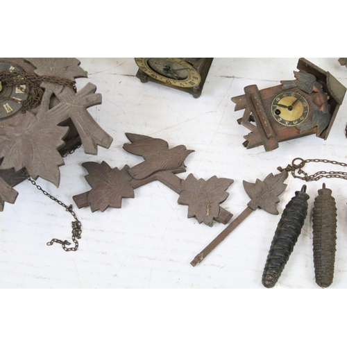 454 - Group of antique clocks to include two black forest cuckoo wall clocks, brass smiths 8 day mantle cl... 