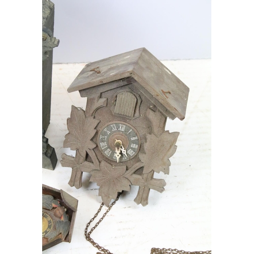 454 - Group of antique clocks to include two black forest cuckoo wall clocks, brass smiths 8 day mantle cl... 