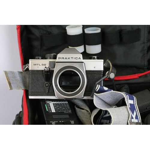 455 - Collection of cameras and associated equipment. The lot to include Nikon FE2 camera with Vivitar 80-... 