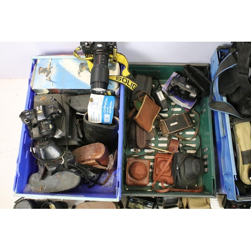 455 - Collection of cameras and associated equipment. The lot to include Nikon FE2 camera with Vivitar 80-... 