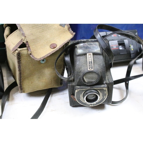 455 - Collection of cameras and associated equipment. The lot to include Nikon FE2 camera with Vivitar 80-... 