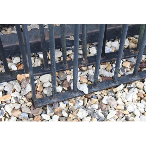 617 - Two wrought iron metal gates, with two gate posts, the larger 170cm high x 115cm wide (including hin... 