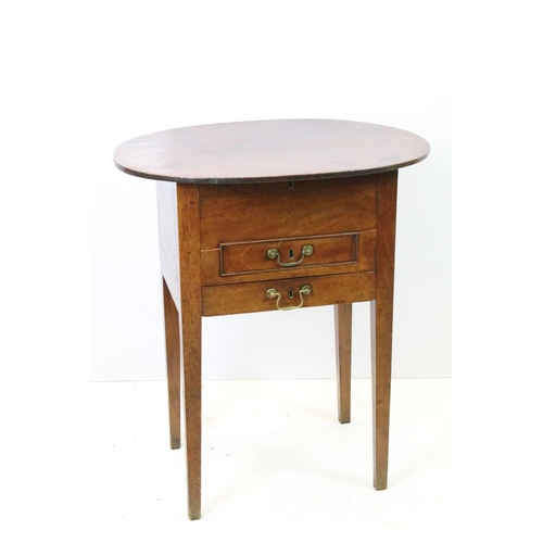 644 - Victorian mahogany sewing box table, the oval lift up lid revealing storage inside, with one faux dr... 