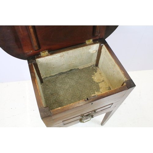 644 - Victorian mahogany sewing box table, the oval lift up lid revealing storage inside, with one faux dr... 