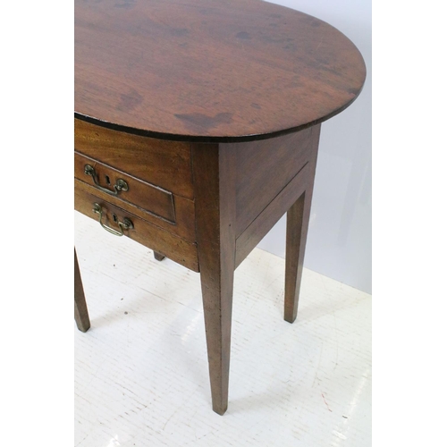 644 - Victorian mahogany sewing box table, the oval lift up lid revealing storage inside, with one faux dr... 