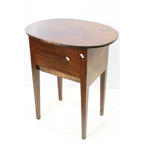 644 - Victorian mahogany sewing box table, the oval lift up lid revealing storage inside, with one faux dr... 