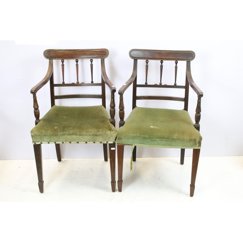 648 - Pair of 19th century mahogany chairs with arms, the backs with turned spindles and reeded arms, each... 