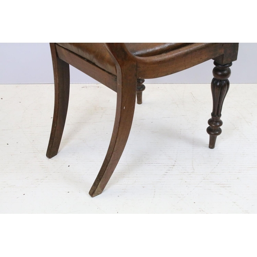 648 - Pair of 19th century mahogany chairs with arms, the backs with turned spindles and reeded arms, each... 