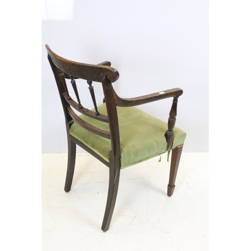 648 - Pair of 19th century mahogany chairs with arms, the backs with turned spindles and reeded arms, each... 