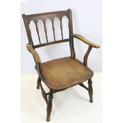 648 - Pair of 19th century mahogany chairs with arms, the backs with turned spindles and reeded arms, each... 
