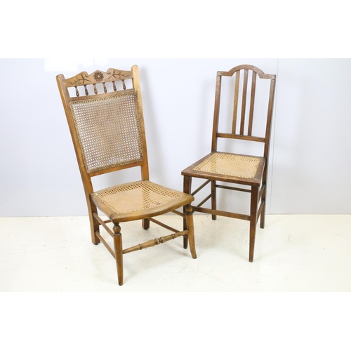 652 - Edwardian low chair, the top rail carved with a flower and foliage, above spindles, the back and sea... 