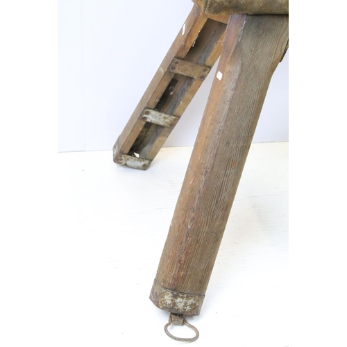 661 - Early 20th century suede pommel horse, with adjustable legs, 87cm high x 75cm wide x 68cm deep