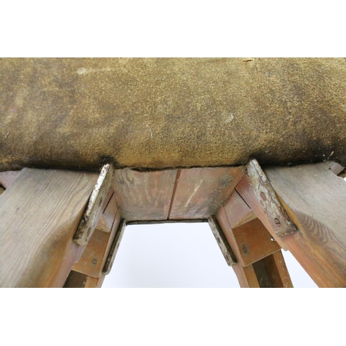 661 - Early 20th century suede pommel horse, with adjustable legs, 87cm high x 75cm wide x 68cm deep