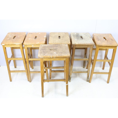665 - Set of six mid Century vintage wooden lab stools stamped Gomm Bros Ltd to underside of seats.