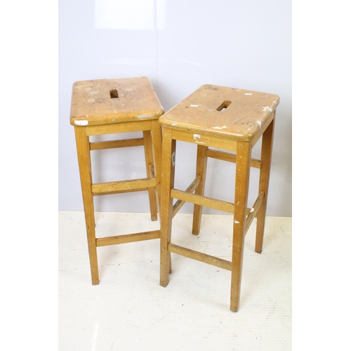 665 - Set of six mid Century vintage wooden lab stools stamped Gomm Bros Ltd to underside of seats.