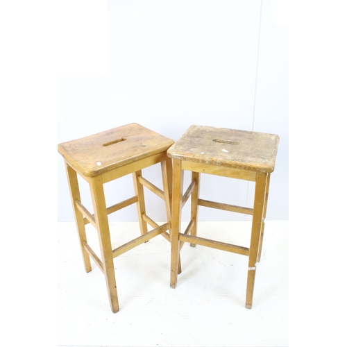 665 - Set of six mid Century vintage wooden lab stools stamped Gomm Bros Ltd to underside of seats.