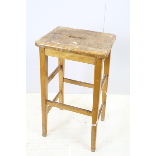 665 - Set of six mid Century vintage wooden lab stools stamped Gomm Bros Ltd to underside of seats.
