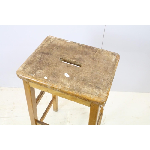 665 - Set of six mid Century vintage wooden lab stools stamped Gomm Bros Ltd to underside of seats.
