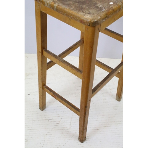 665 - Set of six mid Century vintage wooden lab stools stamped Gomm Bros Ltd to underside of seats.