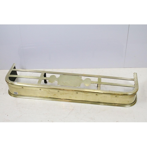 666 - Victorian brass fire fender, with riveted decoration and shaped panel to top, 14.5cm high x 114cm wi... 