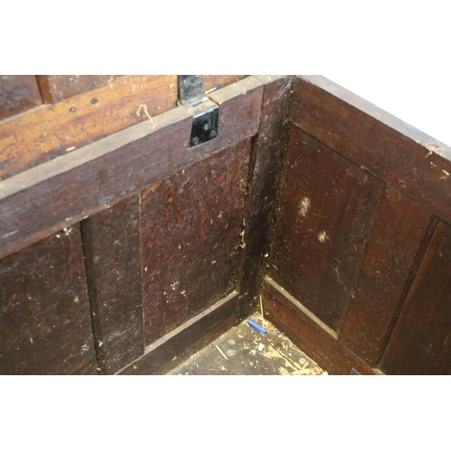 676 - 19th century carved oak chest of substantial proportions, the four panelled lid above carved front, ... 
