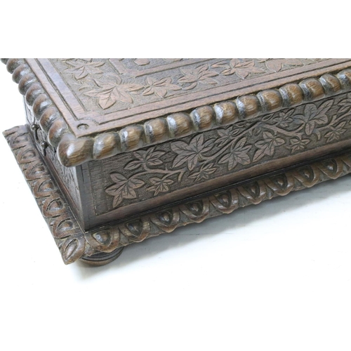 679 - Vintage carved oak bible box with the initials ES and dated 1892, 17cm high x 45cm x 27cm deep