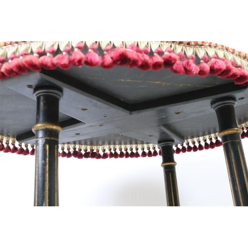 688 - Ebonized occasional table, of x-stretcher form, with fringed velvet covered oval top, on turned curv... 