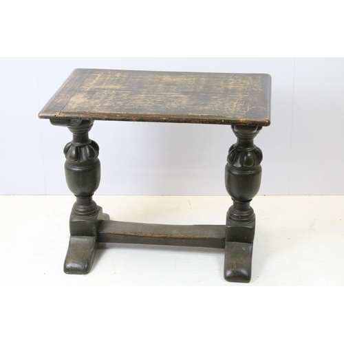 690 - Oak occasional table on substantial turned legs, 59cm high x 70cm wide x 46cm deep