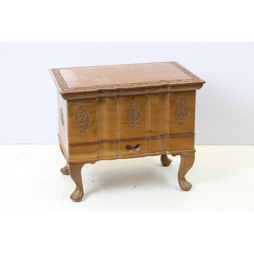 700 - 20th century carved sewing box, with drawer below on cabriole legs, with extensive contents includin... 