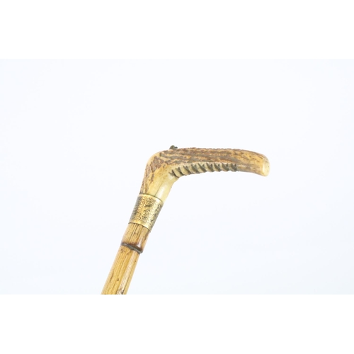 127 - Two vintage riding crops to include a bamboo example with gold plated collar, together with a late 1... 