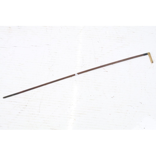 127 - Two vintage riding crops to include a bamboo example with gold plated collar, together with a late 1... 