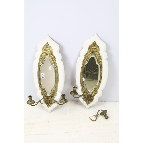 170 - Pair of gilt metal girondel wall mirrors with bevelled glass, each with two branch candle sconces, e... 