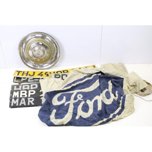 171 - Vintage Ford advertising flag, 120 x 175cm, Rolls Royce hubcap and a collection of seven vintage num... 