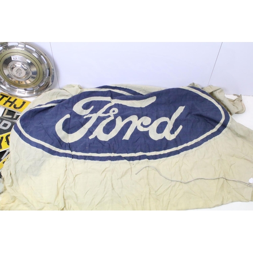 171 - Vintage Ford advertising flag, 120 x 175cm, Rolls Royce hubcap and a collection of seven vintage num... 