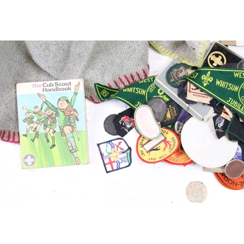 457 - Collection of mid century boy scout related items to include patches and badges, handbooks, and two ... 