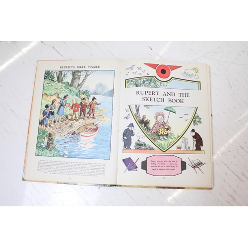 461 - Collection of Rupert annuals (mostly 1900's examples) together with a selection of Rupert accessorie... 