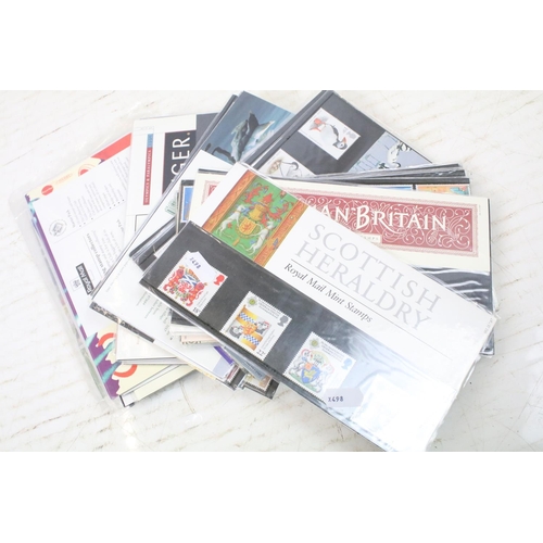 462 - Small collection of mainly British presentation packs together with a  quantity of new stamps on pap... 