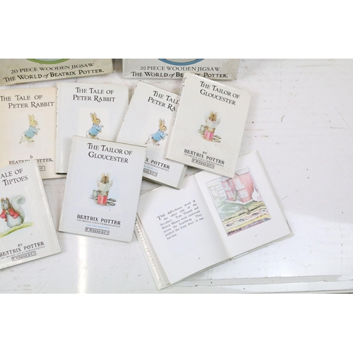 466 - Collection of vintage Beatrix Potter books and jigsaw puzzles together with a small quantity of othe... 