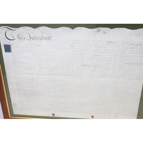 599 - Two 18th / 19th century indentures, the largest 83 x 101.5cm overall, framed and glazed together wit... 