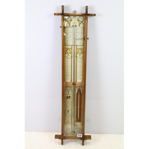 639 - Early 20th century oak cross framed Admiral Fitzroys barometer, with paper dial, the sides with twin... 